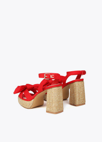 Heeled sandals with bow