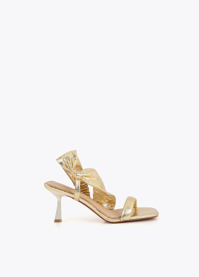 Heeled sandals with metallic straps