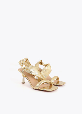 Heeled sandals with metallic straps