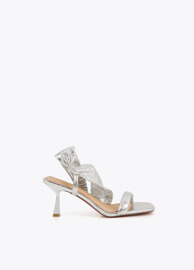 Heeled sandals with metallic straps