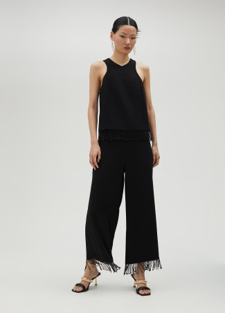 Pantalón con flecos y pedrería