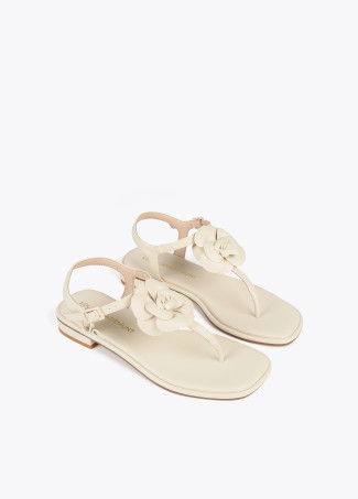 Sandales avec bride à entre-doigts et fleur
