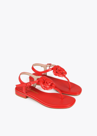 Sandalen mit Zehenriemen und Blumendetail