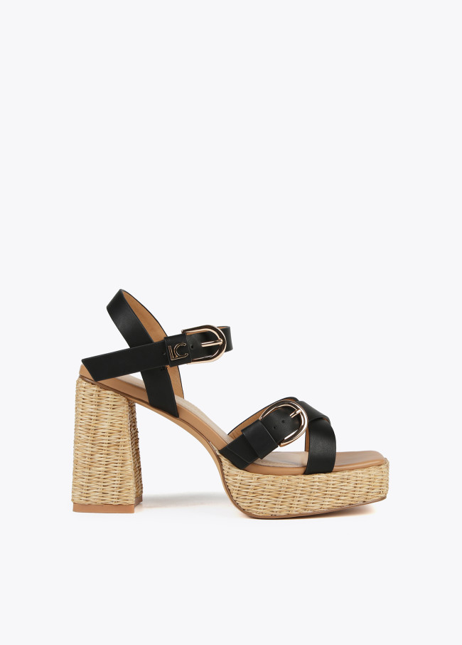 Heeled sandals with buckles