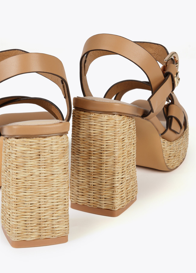 Heeled sandals with buckles