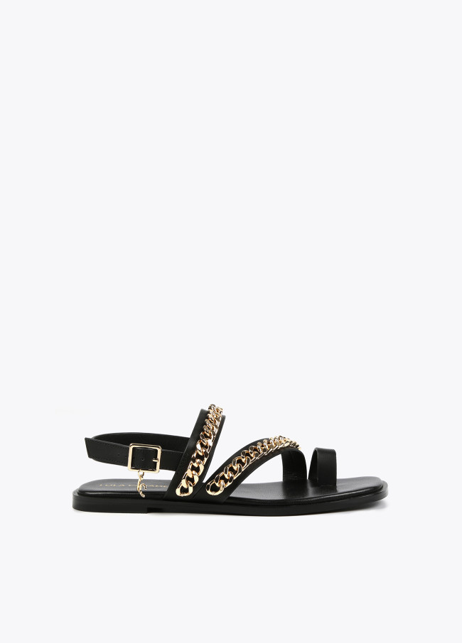 Flat sandals with chain details