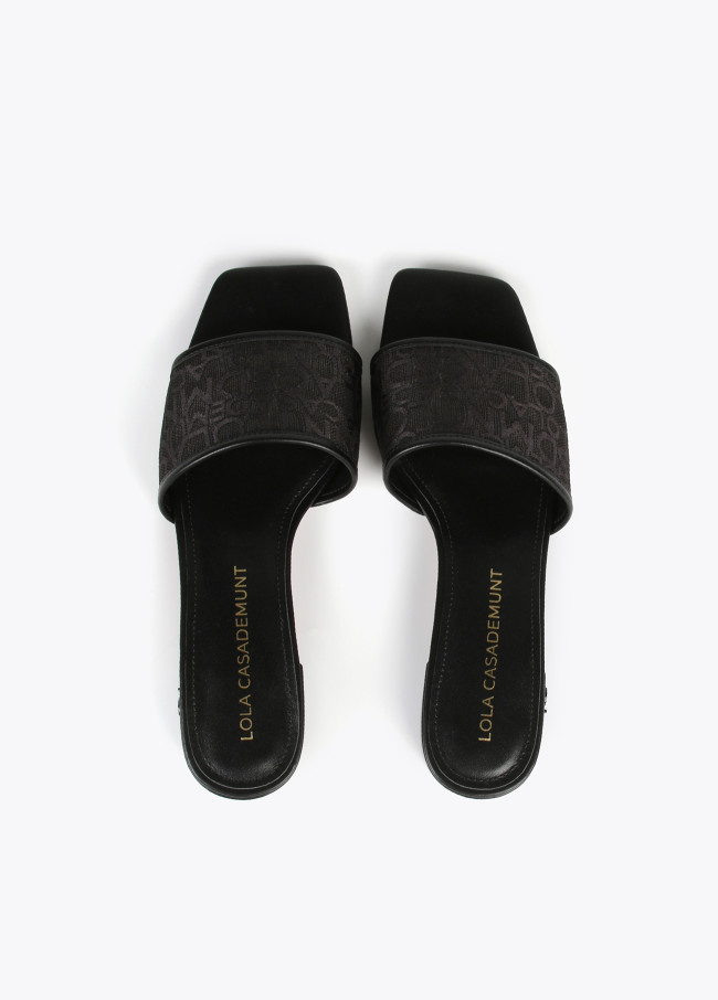 Slider sandals in monogrammed mesh