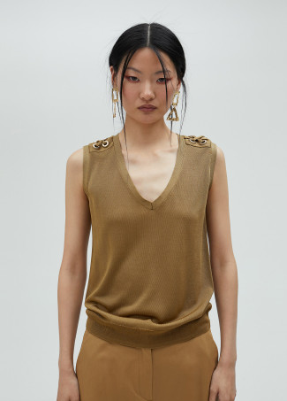 Top in maglia con occhielli