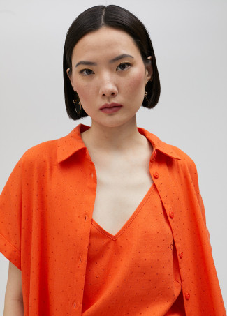 Blusa comprida com pormenor de strass