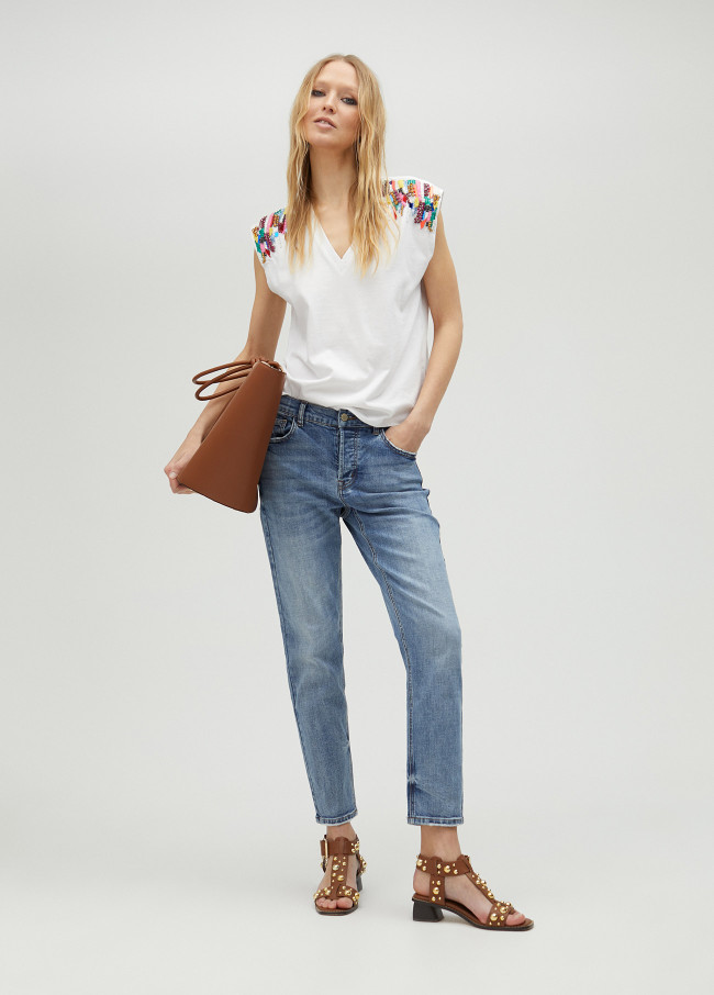 Top with rhinestones on the shoulders