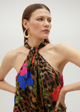 Top halter con volumen animal print y flores