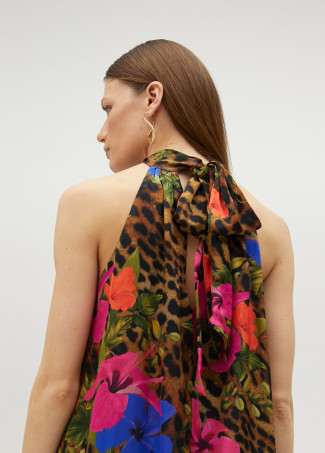 Top halter con volumen animal print y flores