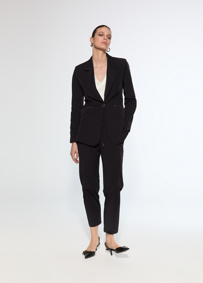 Blazer in tessuto tecnico con borchie