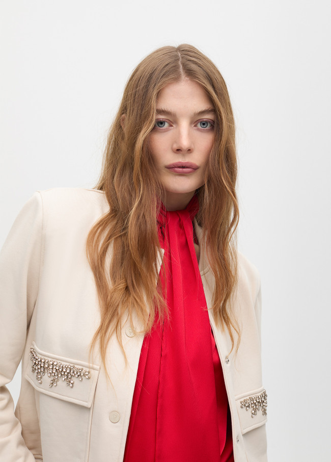 Bomber jacket with jeweled pocket detail