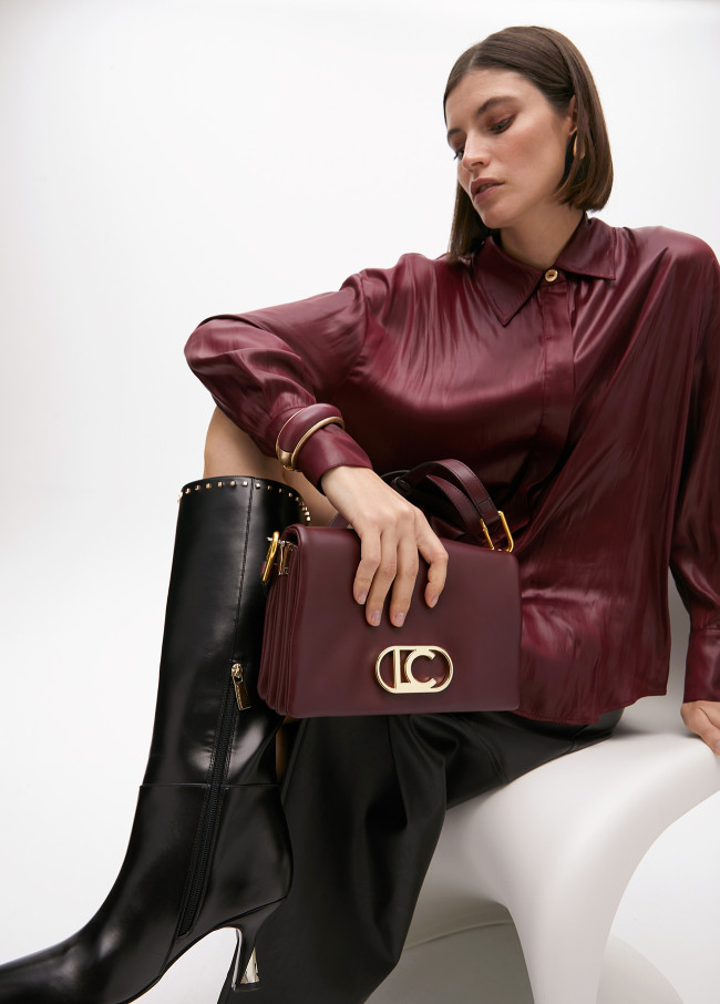 Faux leather crossbody bag with three...