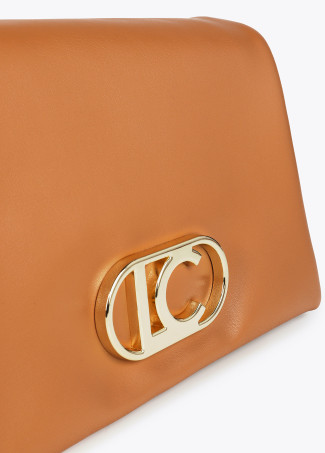 Faux leather crossbody bag with three compartments and flap.