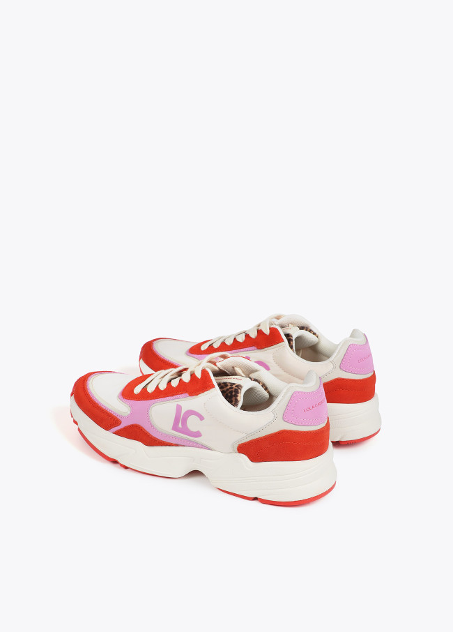 Trainers with running sole and combination of...