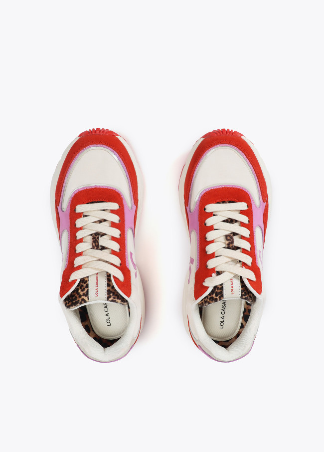 Trainers with running sole and combination of...