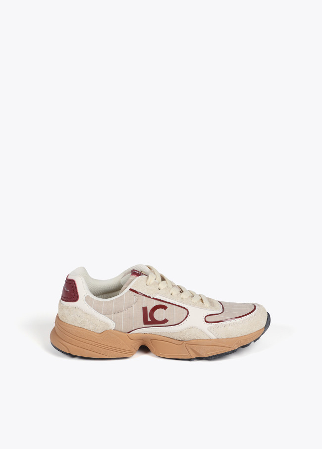 Trainers with running sole and combination of...