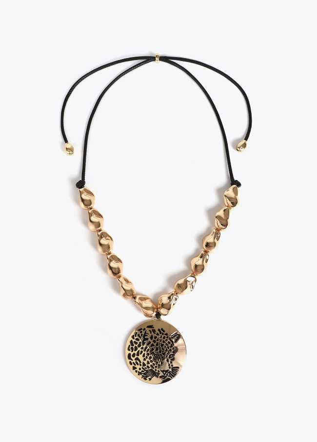 Cord necklace with golden pieces and rhinestone...