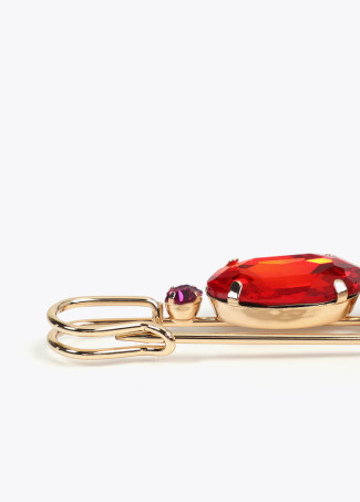 Contrast crystal brooch