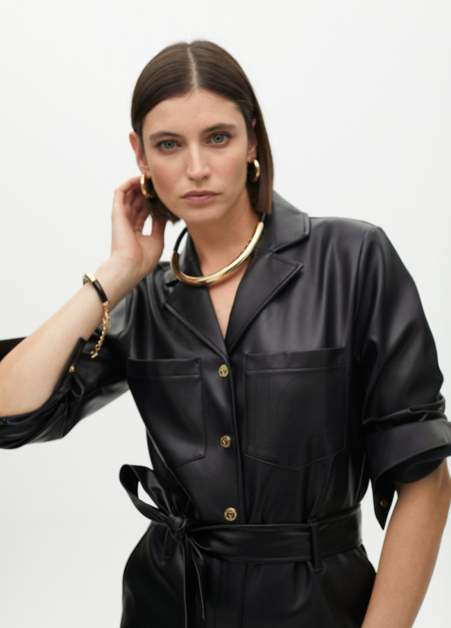 Short faux leather tube necklace with cutwork...