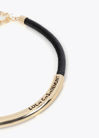 Short faux leather tube necklace with cutwork metal logo