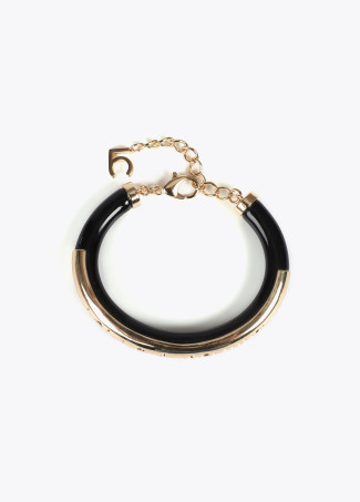 Acrylic tube bracelet with metal cutwork logo