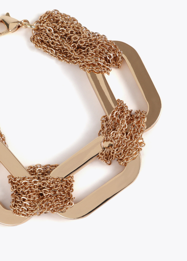 Linked multi-strand bracelet