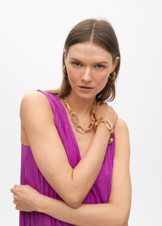 Linked multi-strand bracelet