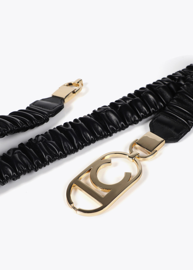 Stretch faux leather belt with oval logo