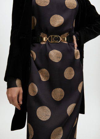 Stretch faux leather belt with oval logo