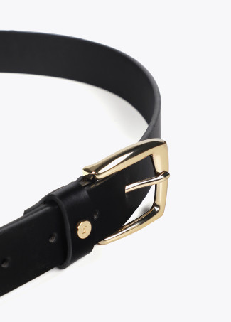 Belt with cutwork logo