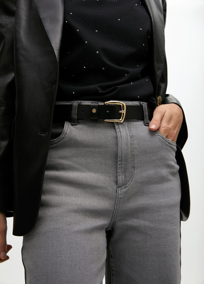 Belt with cutwork logo