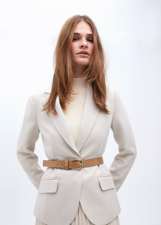 Belt with cutwork logo