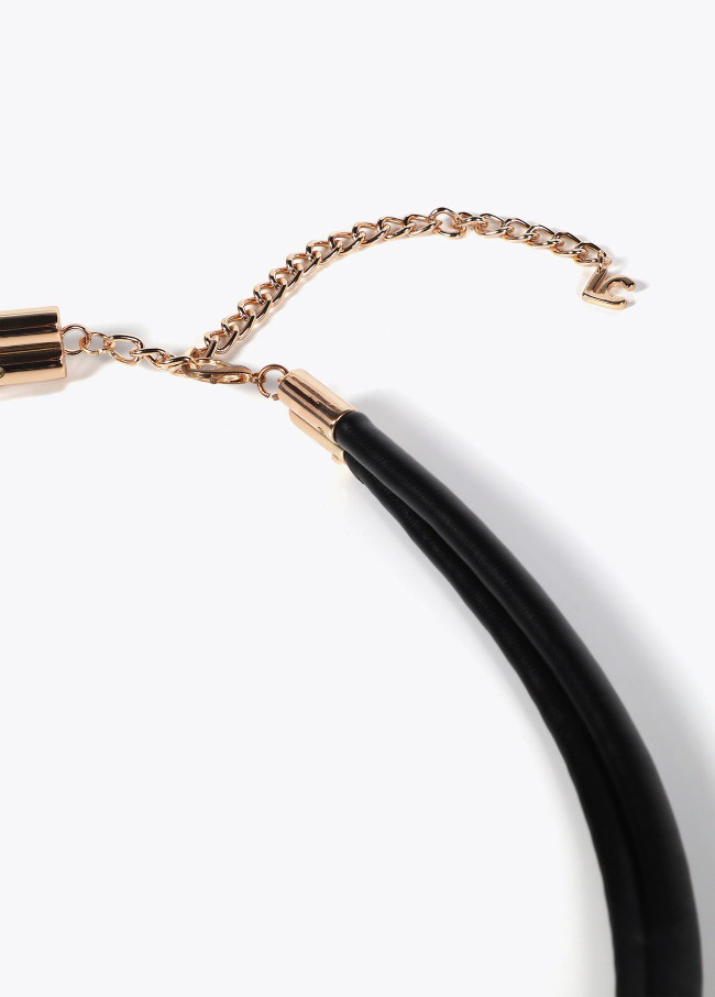 Faux leather strappy belt with oval logo