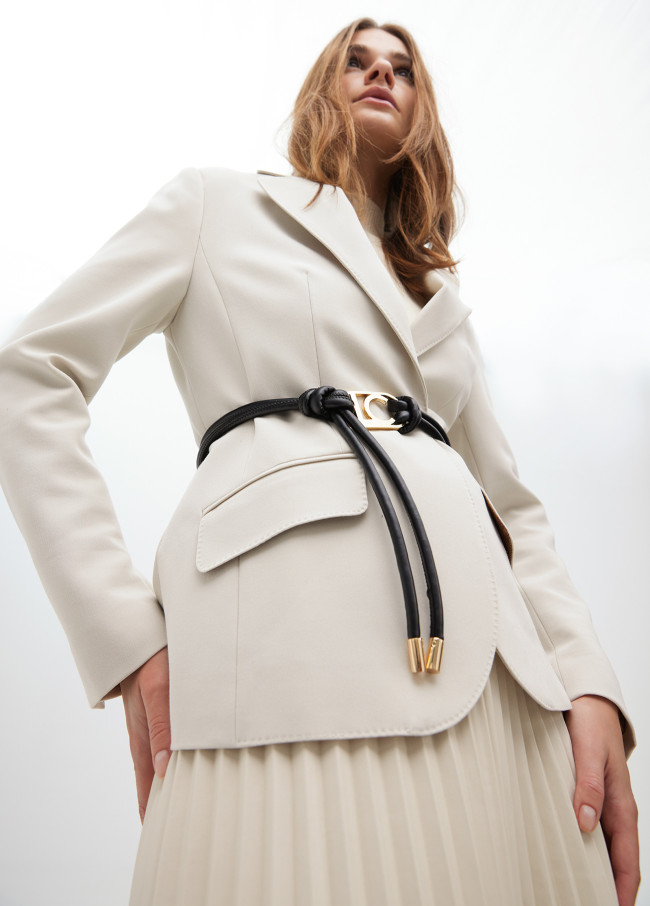 Faux leather strappy belt with oval logo