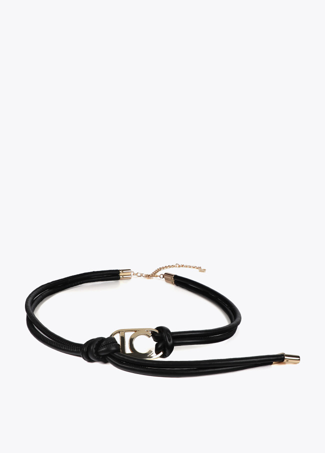 Faux leather strappy belt with oval logo