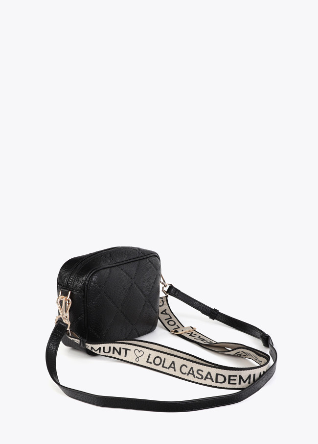 Faux leather crossbody bag with diamond design...