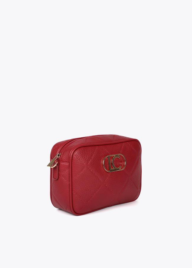 Faux leather crossbody bag with diamond design...