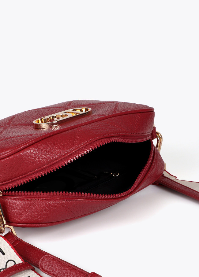 Faux leather crossbody bag with diamond design...