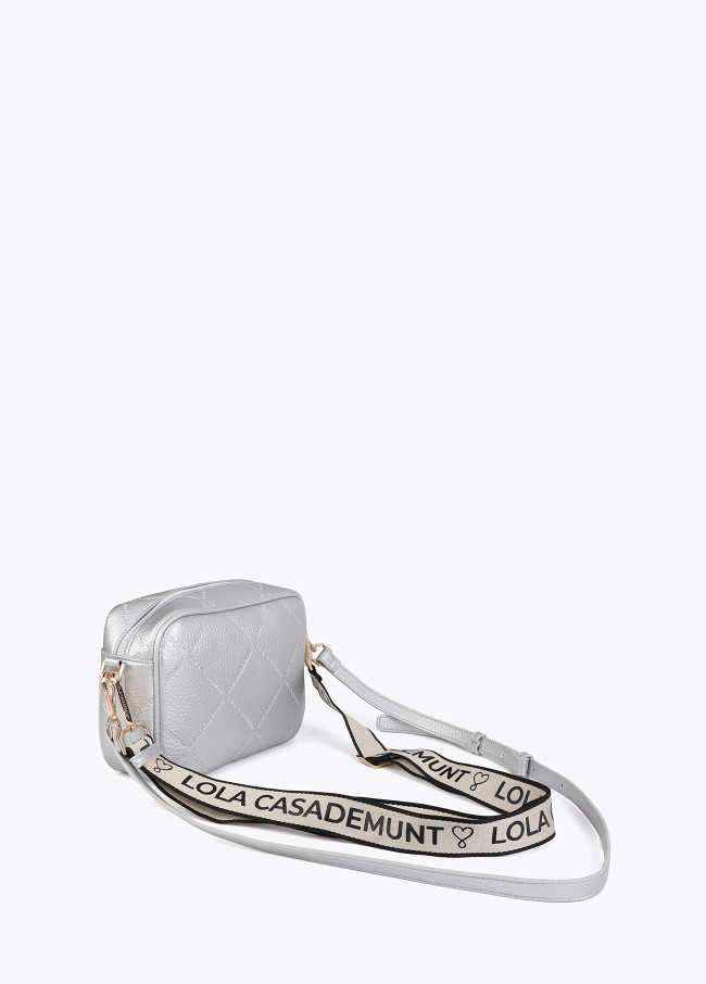 Faux leather crossbody bag with diamond design...