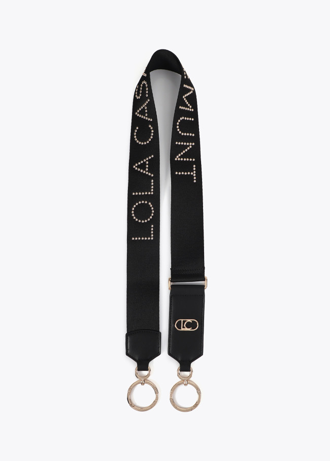 Bag strap with metallic studs and logo