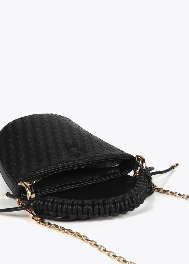 Crossbody bag with flap in braided faux leather...