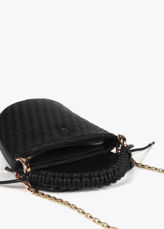 Crossbody bag with flap in braided faux leather material