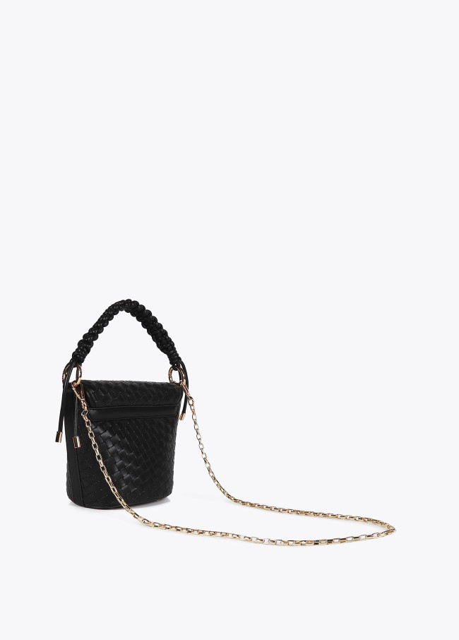 Crossbody bag with flap in braided faux leather...