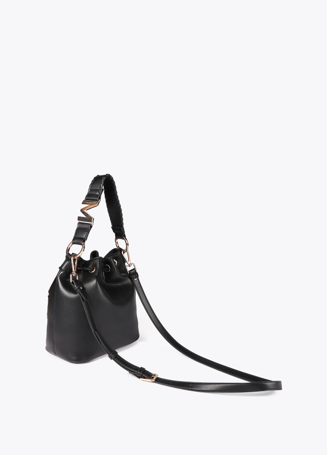 Pouch bag with circular metallic eyelets