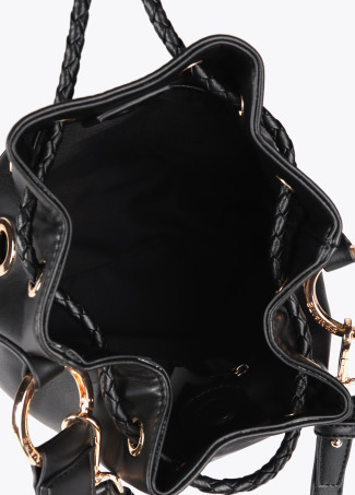 Pouch bag with circular metallic eyelets