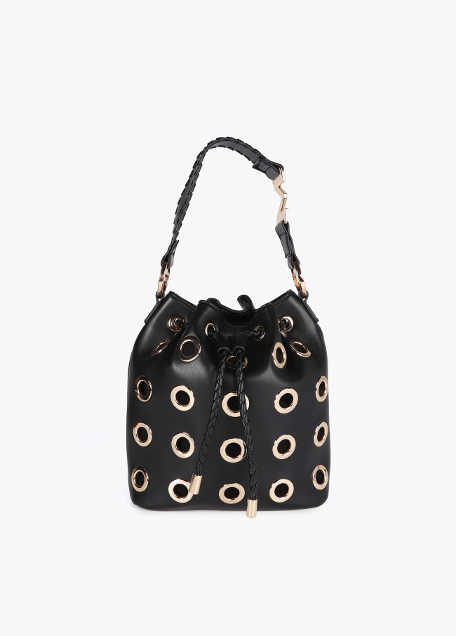 Pouch bag with circular metallic eyelets