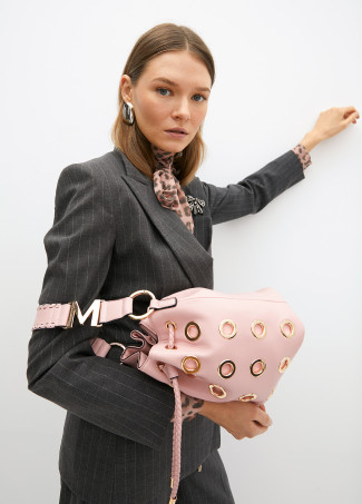 Pouch bag with circular metallic eyelets